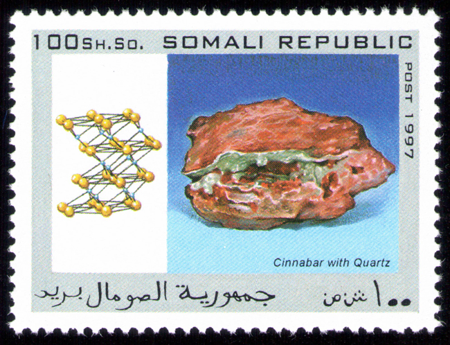 The national postal infrastructure was later completely destroyed during the civil war, with Somali Postal officially suspending operations in October 1991. Postage stamps continued to be produced illegally internationally during the war, although their subject matter suggests they were designed for external collectors. The set of mineral stamps in this album from the Somali republic are examples of hundreds of bogus topical stamps produced up to 2013. The Universal Postal Union is now assisting the reestablished Somali Postal Service to develop its capacity, including providing technical assistance and basic mail processing equipment. In October 2014, the Ministry of Posts and Telecommunications also relaunched postal delivery from abroad. The postal system is slated to be implemented throughout the country via a new postal coding and numbering system. According to the Minister of Posts and Telecommunications Mohamud Ibrihim Adan, the relaunch's next phase will enable local residents to send letters to acquaintances overseas.
Source: https://en.wikipedia.org/wiki/Postage_stamps_and_postal_history_of_Somalia Somali-Republic-1997-Cinnabar-and-Quartz.jpg